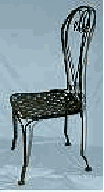 wrought iron chair in burnt wax finish